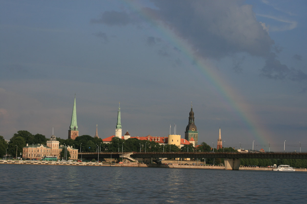 Riga from across the river with a rainbow